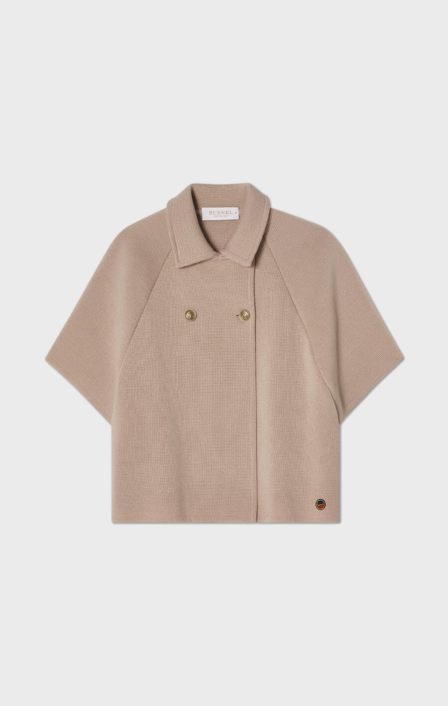 Gertrude kort stickad cape i ull beige