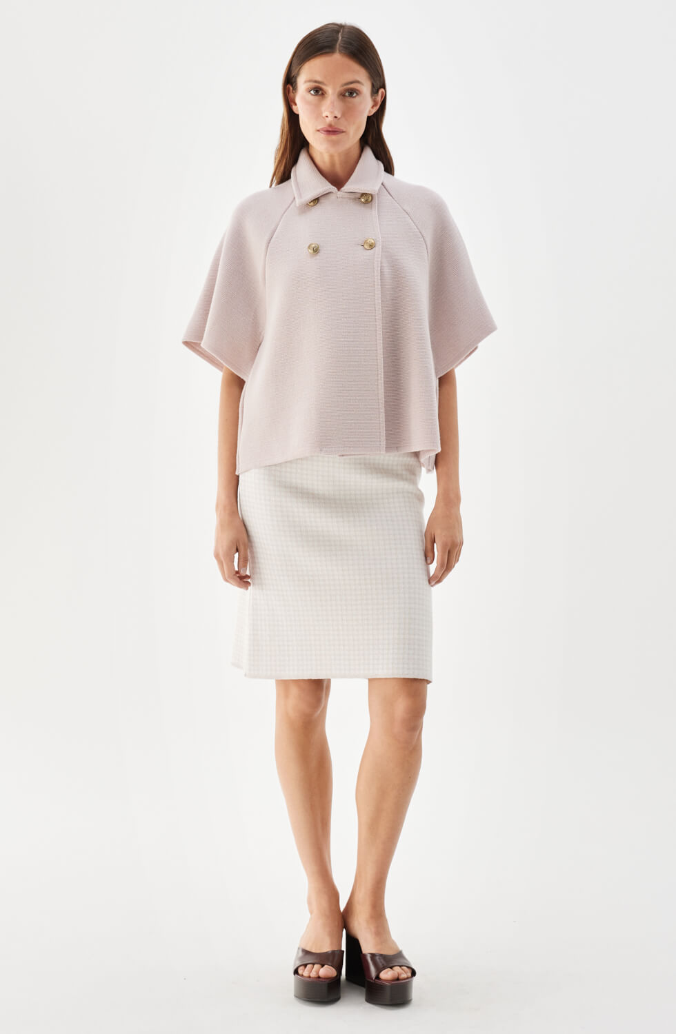 Gertrude stickad cape i ull ljusrosa