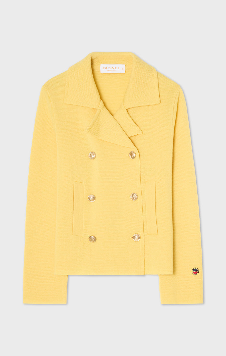 Indra stickad jacka i ull gul