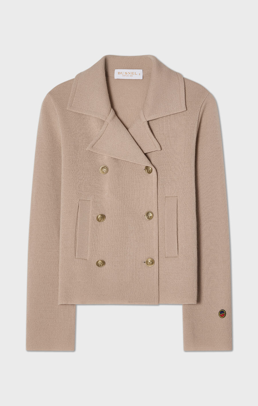 Indra stickad jacka i ull beige