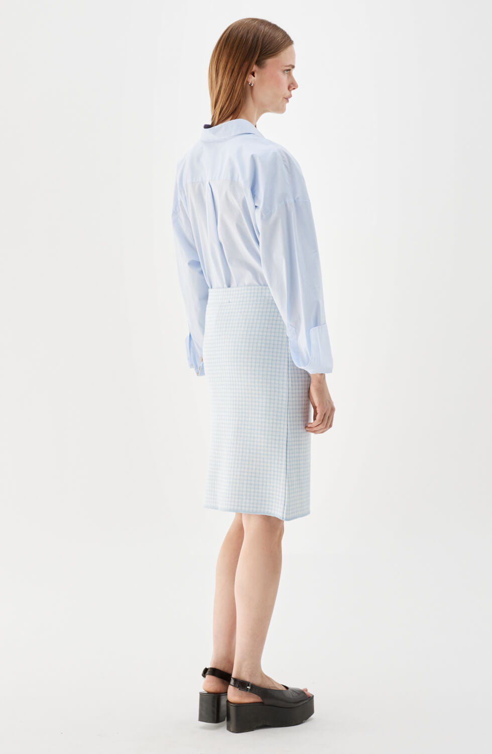 Minelle rutig minikjol ljusblå