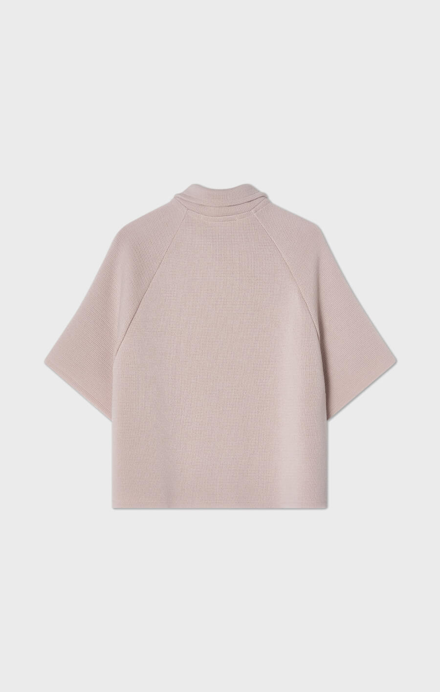 Gertrude stickad cape i ull ljusrosa